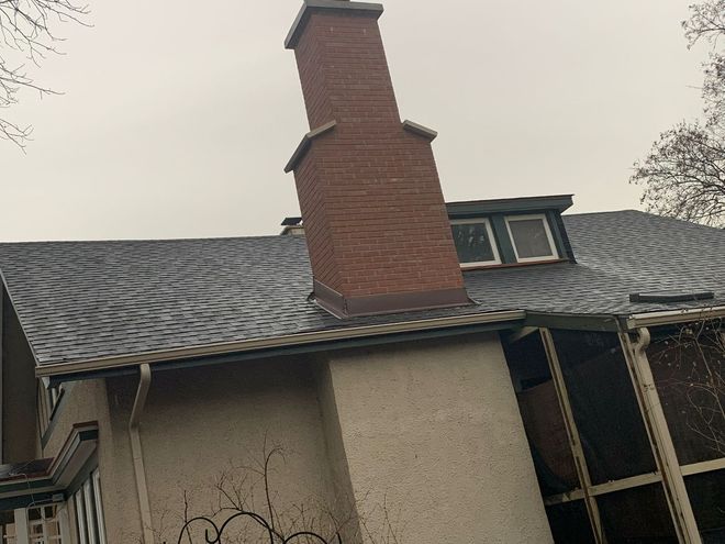 Brick chimney on a residential house 