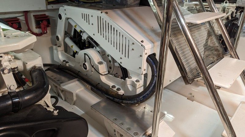 A close up of a boat engine on a boat.