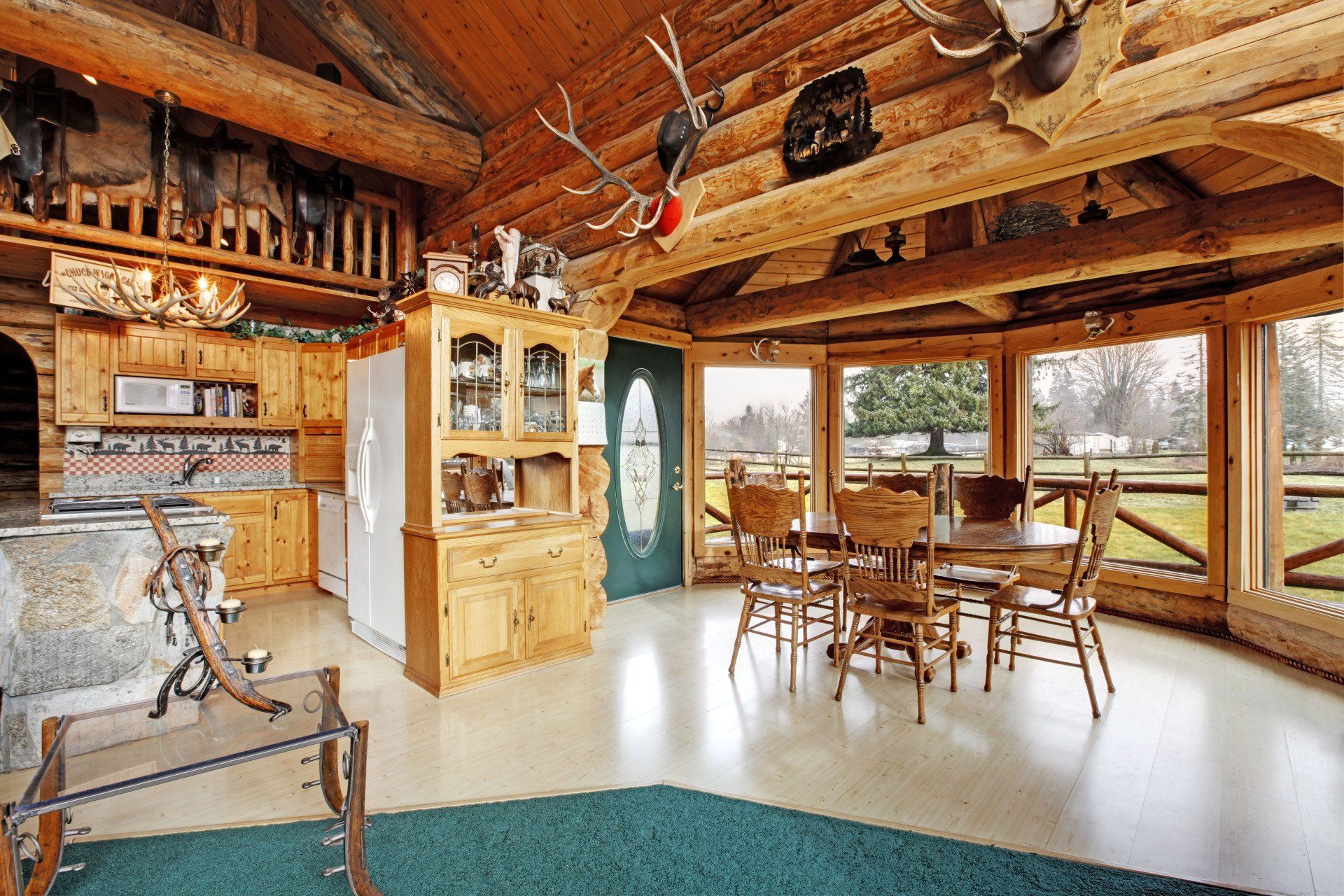 A large room with a table and chairs in it