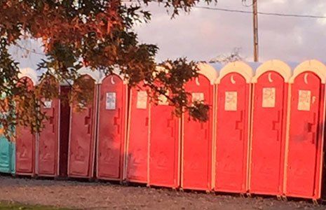 Red portable toilets