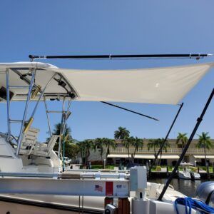 A boat with an umbrella on top of it