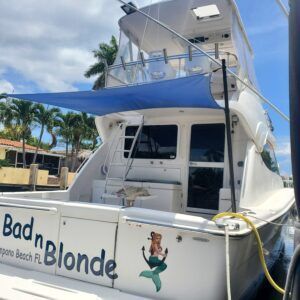 A boat with the name bad n blonde on it