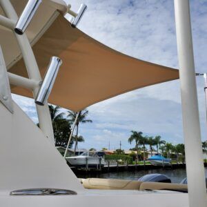 A view of a body of water from the back of a boat