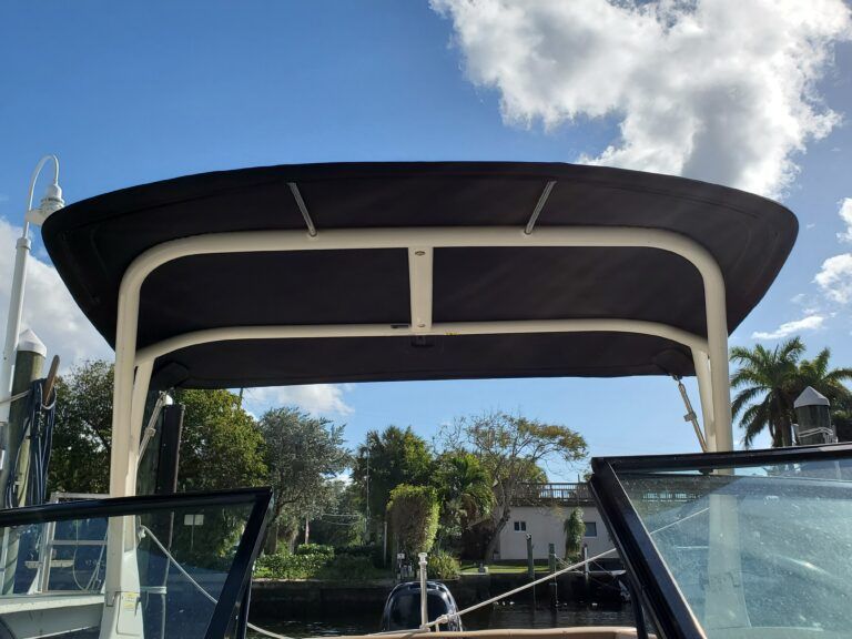 A boat with a canopy on top of it