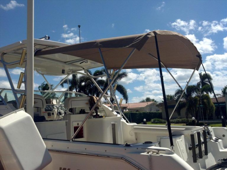 A boat with a canopy on top of it