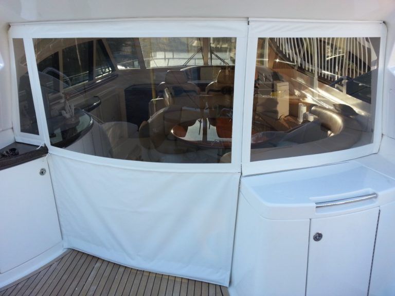 The inside of a boat with a large window