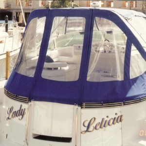 A white boat with the name leticia on it