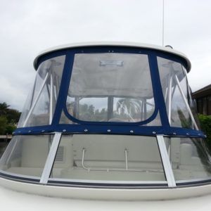 A boat with a clear canopy on top of it
