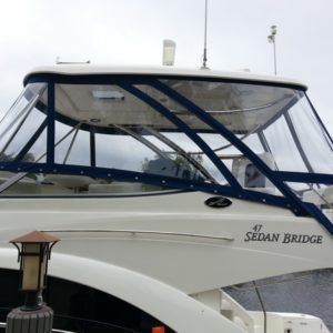 A white boat with the name sedan bridge on the side