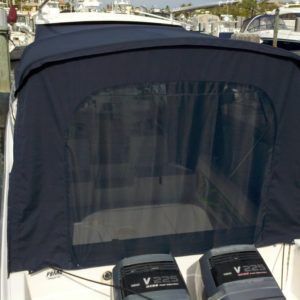 A boat with a canopy and two motors on it