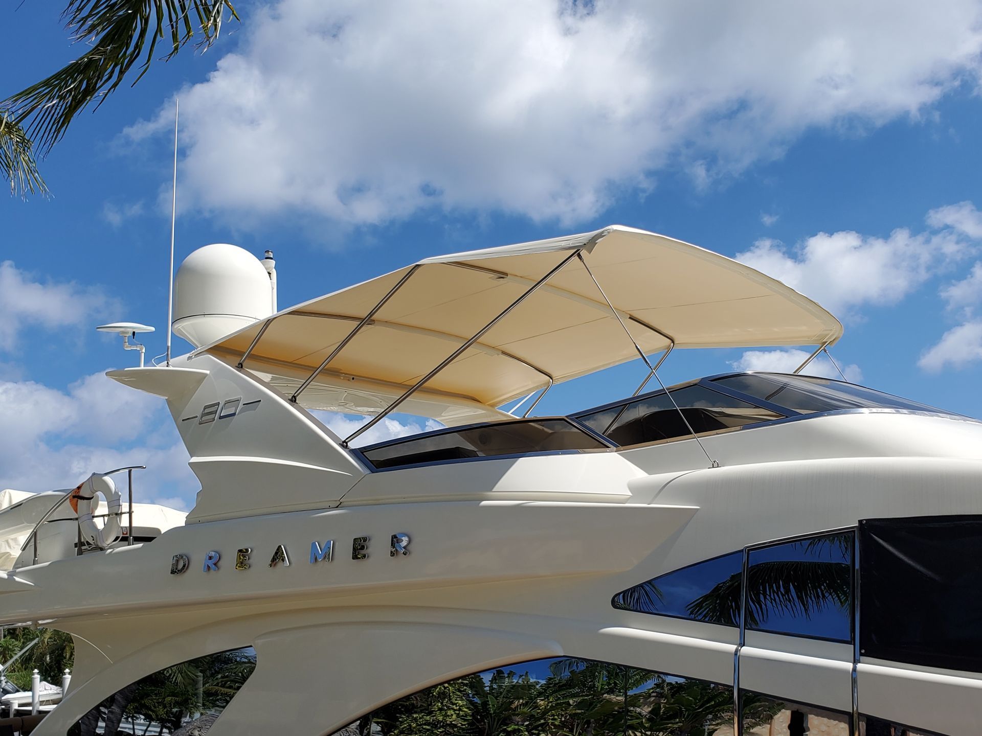 A white yacht with the word breaker on the side