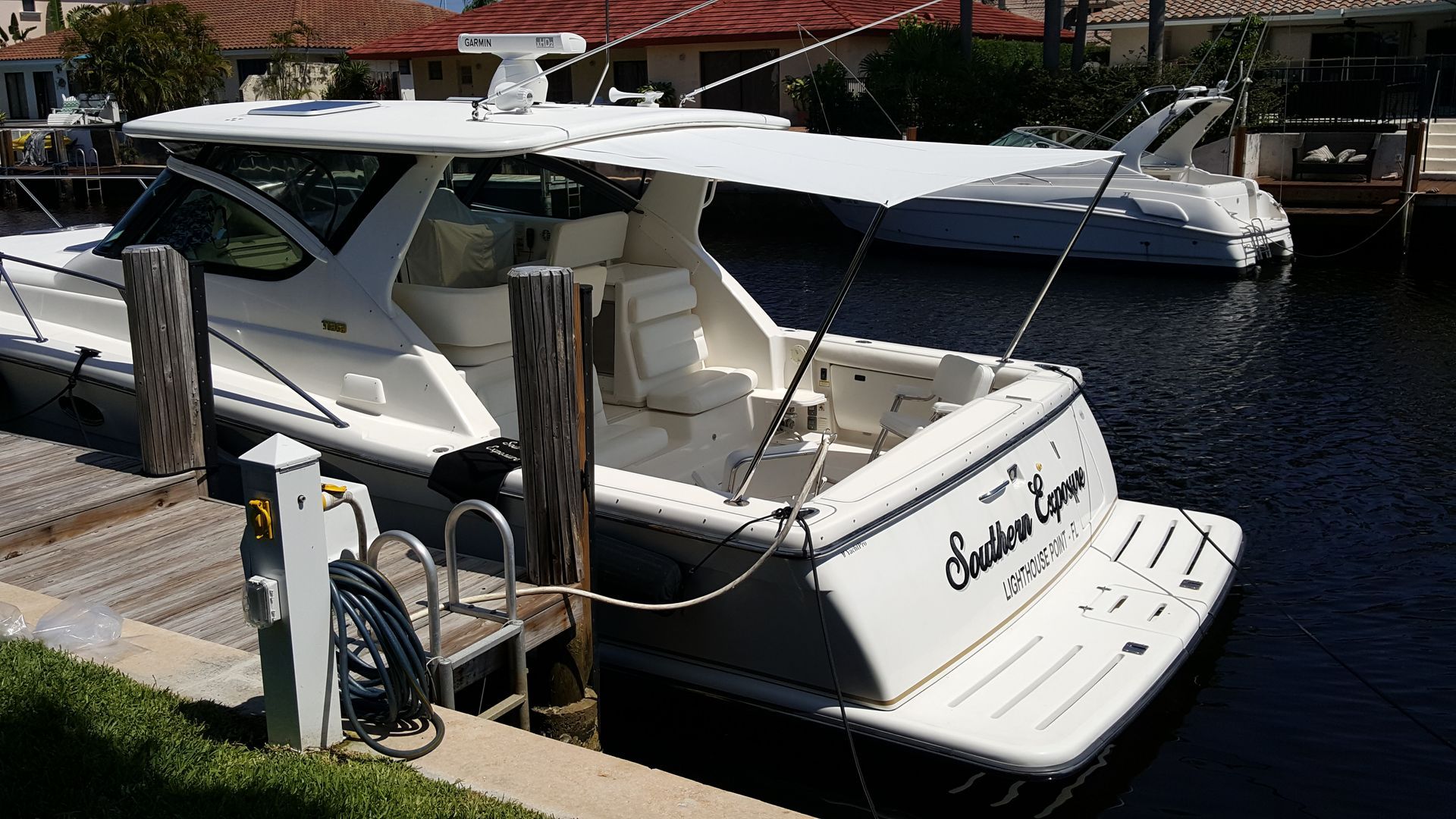 A white boat with the name chester lynn on the back