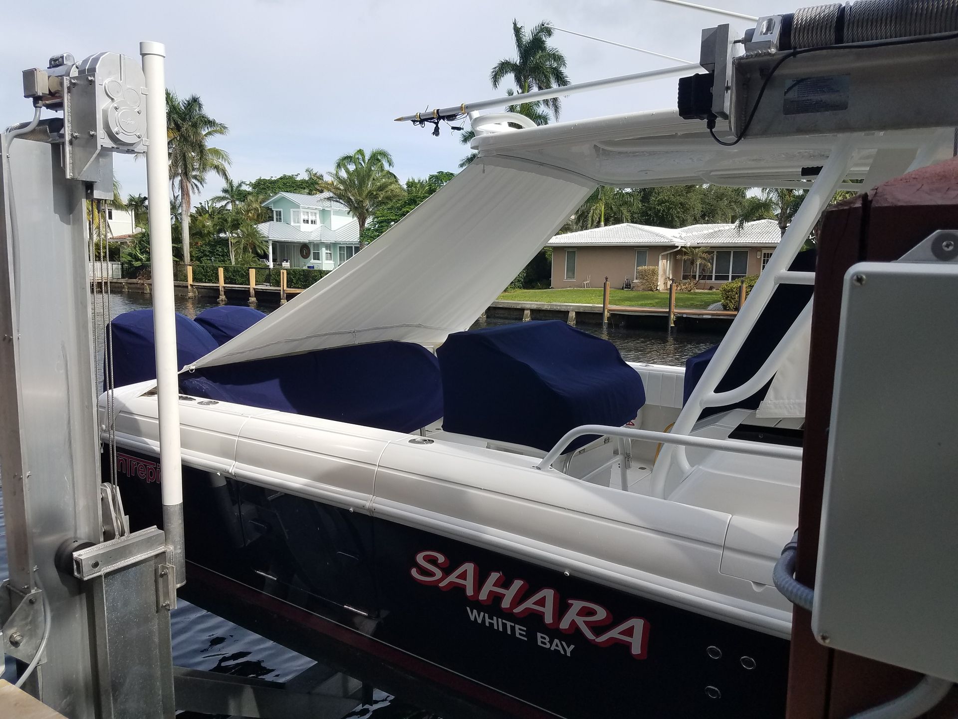 A boat with the name sahara on the side