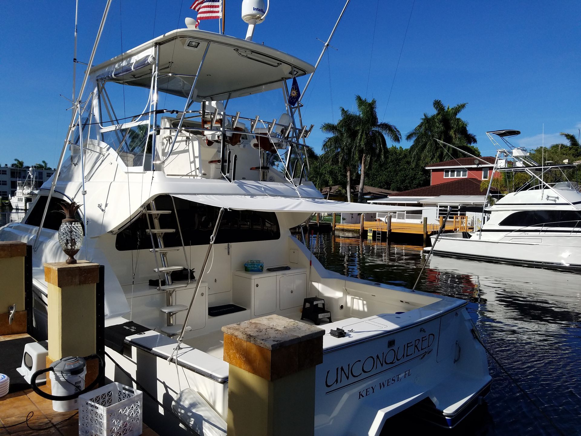 A large white boat with the name lincoln on the back