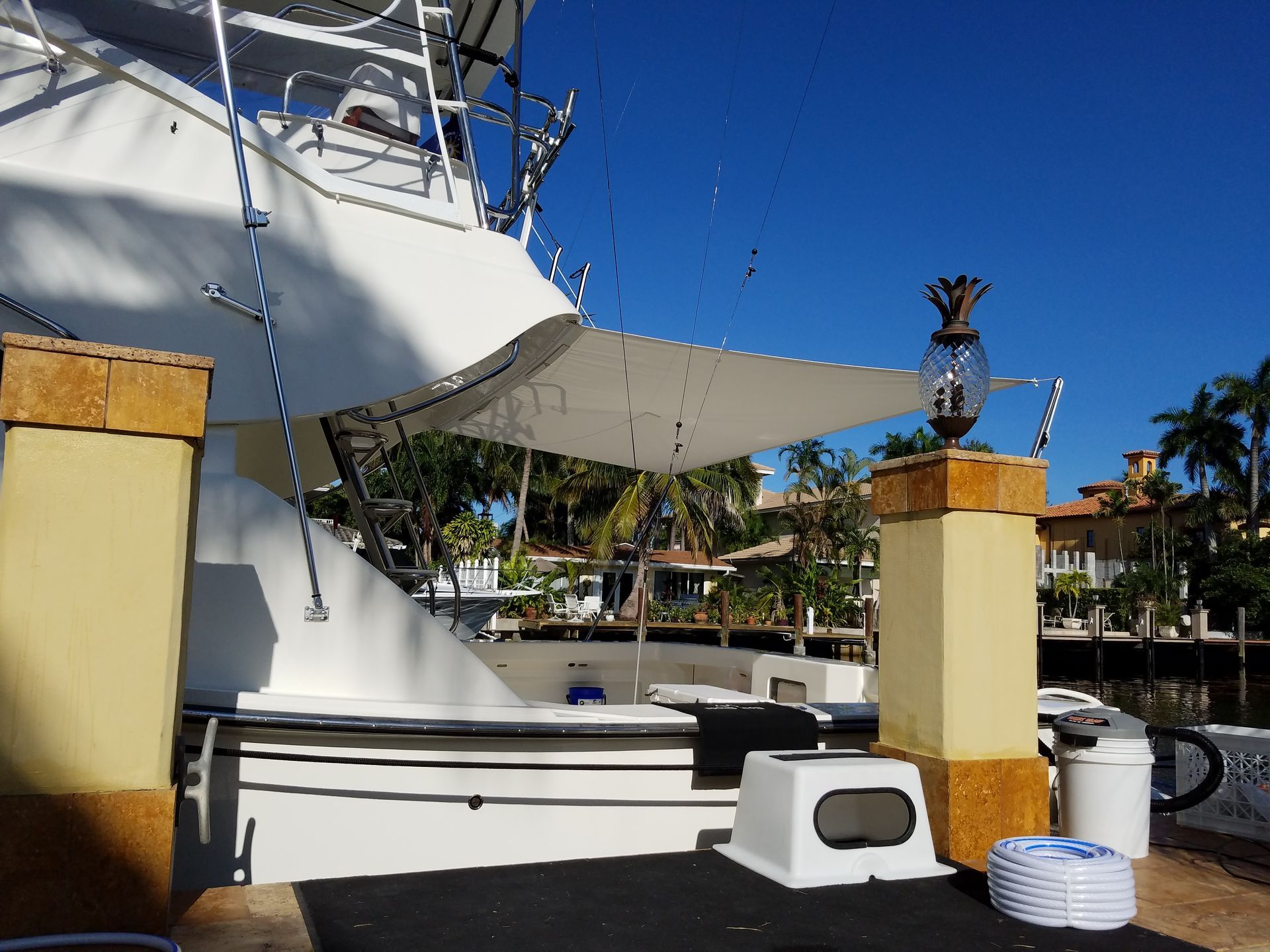 A boat with a pineapple on top of it