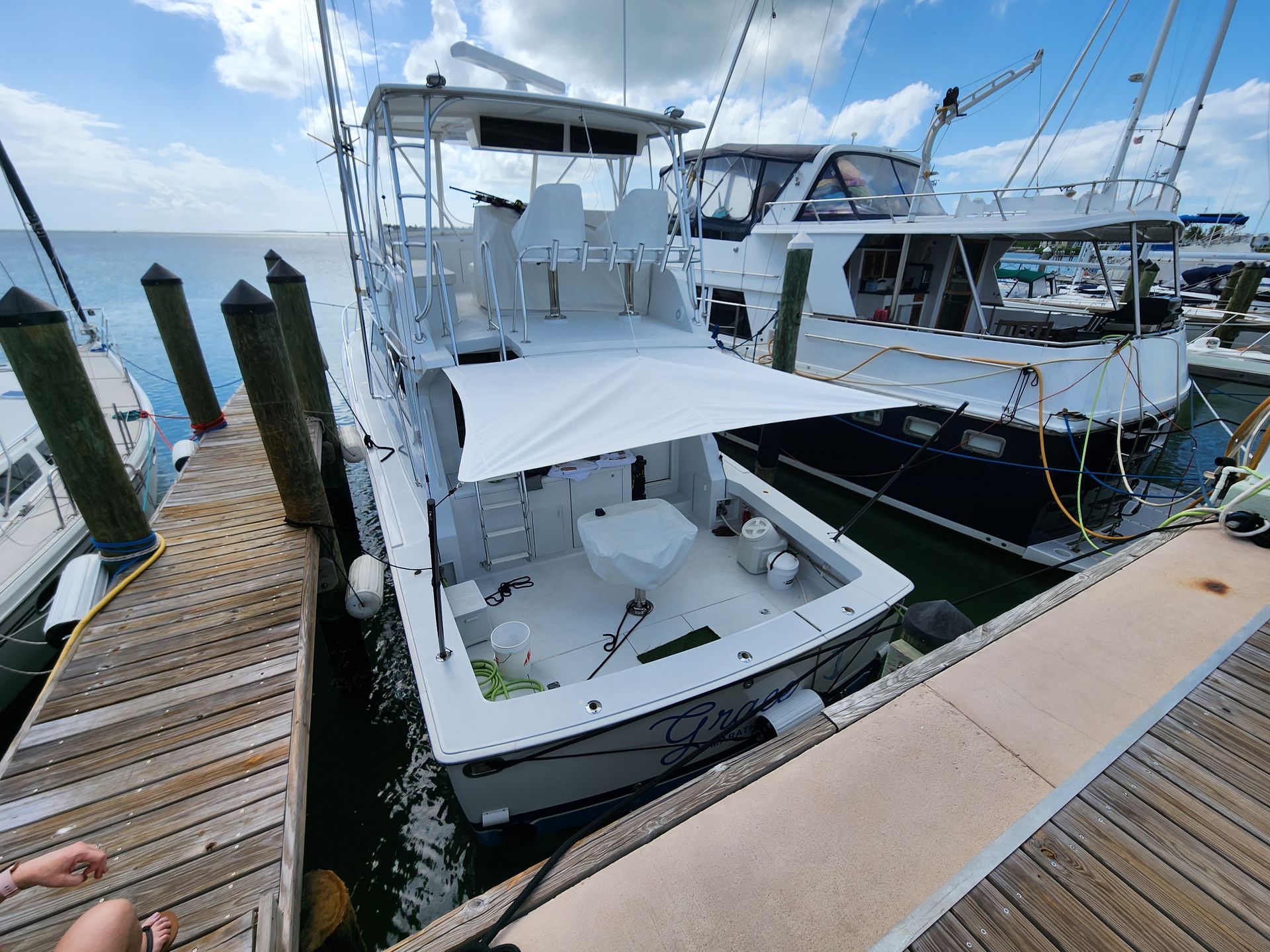 A boat is docked at a dock in the water.