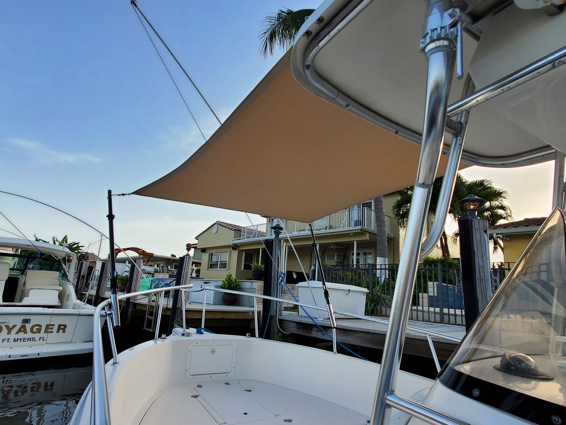 A boat with a shade sail on top of it
