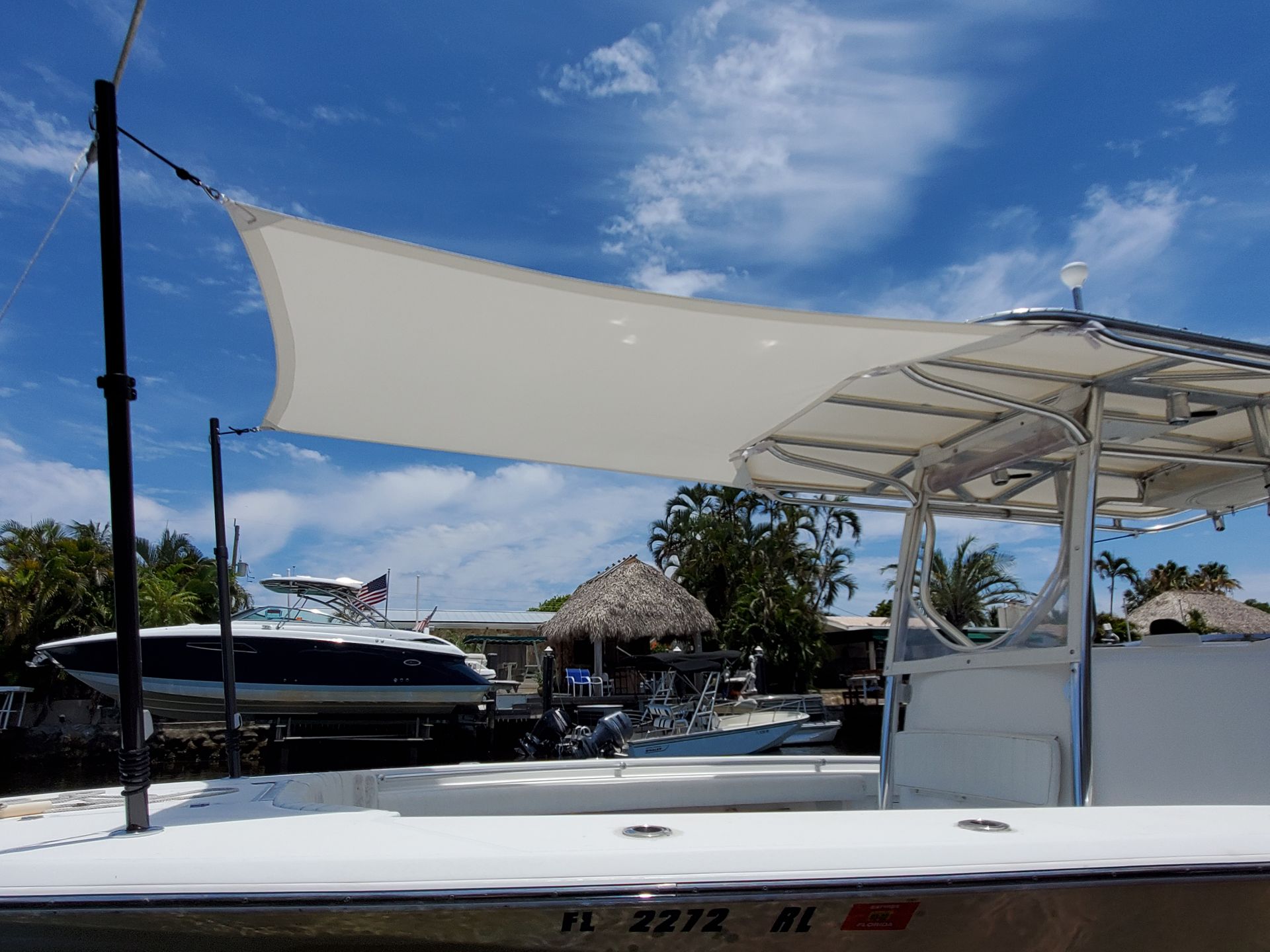 A boat with a shade sail on top of it