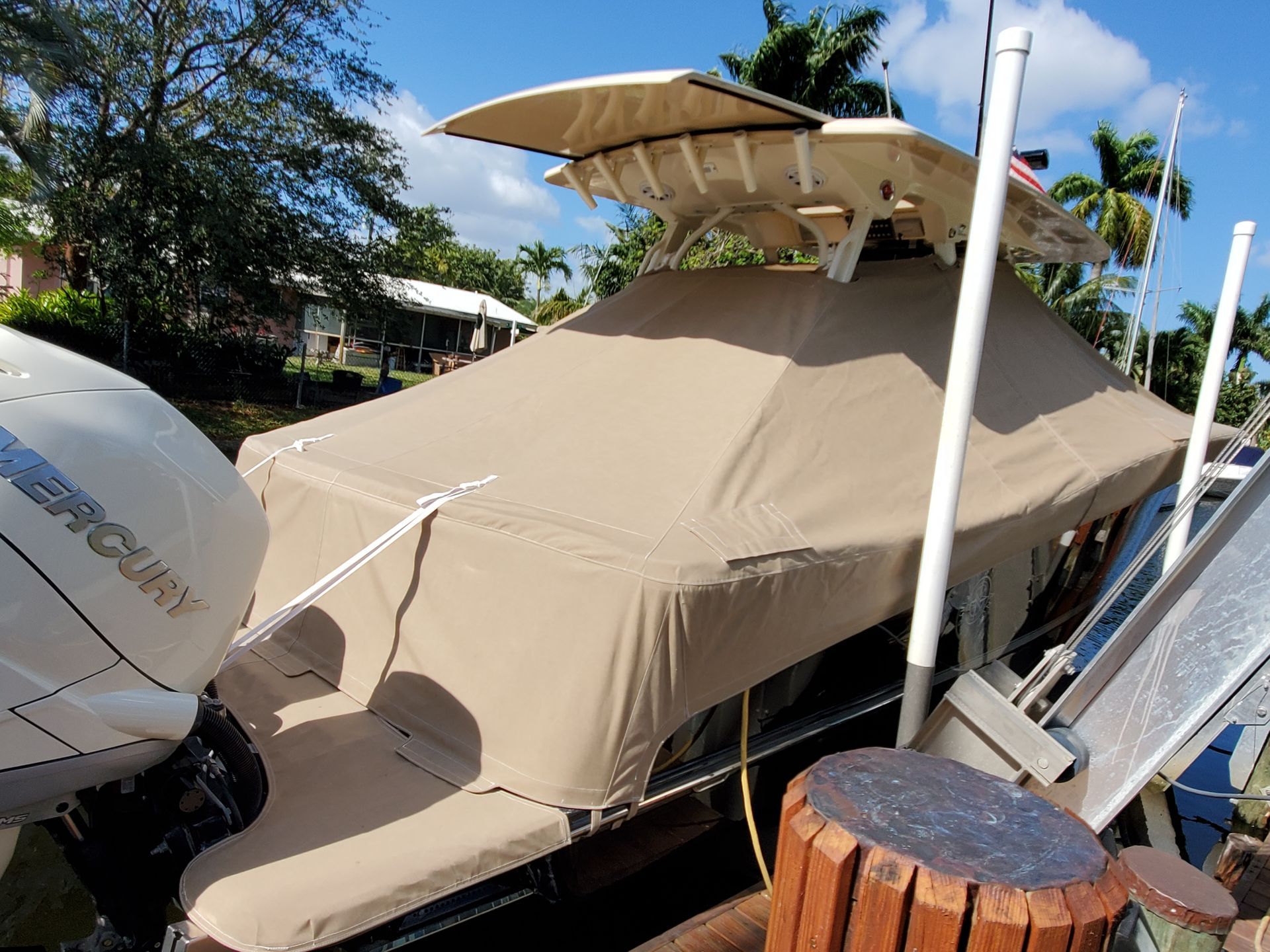A mercury outboard motor sits on a boat
