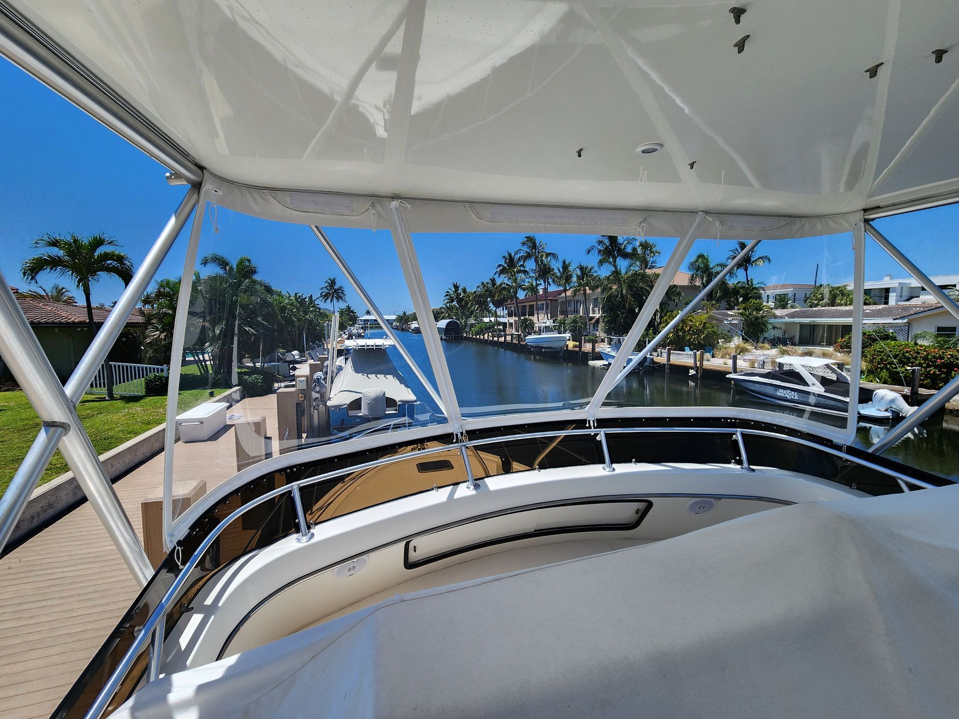 A view of a body of water from the deck of a boat