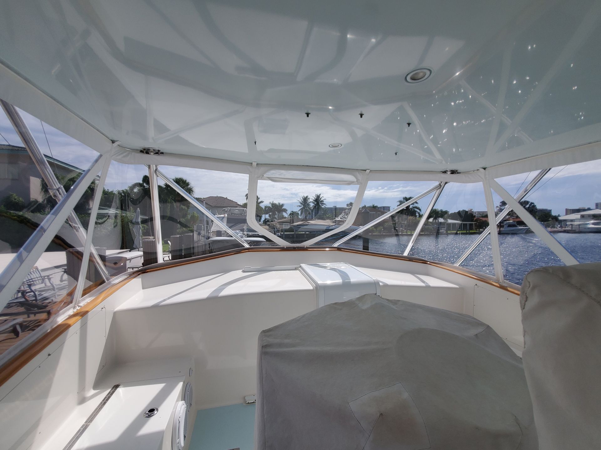 The inside of a boat with a clear roof