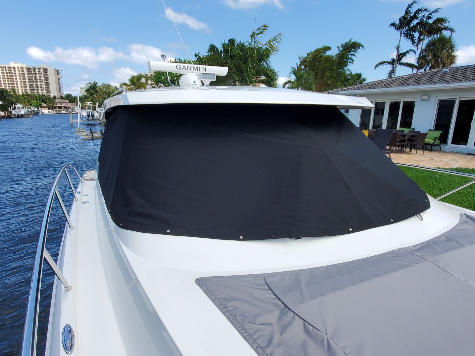 A white boat with the word dreamer on the side