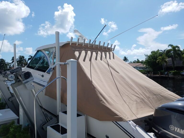 A boat with a yamaha engine is docked in a marina