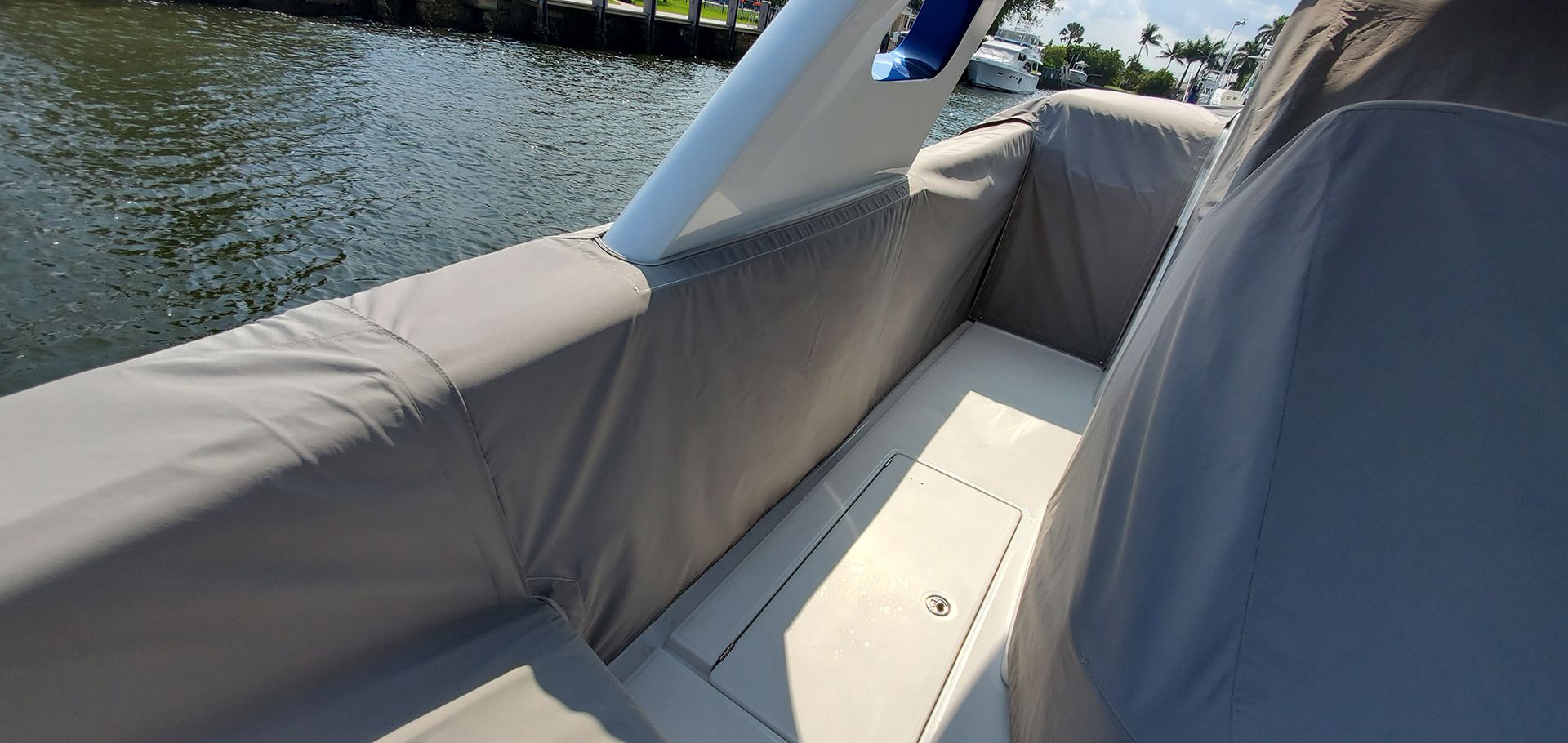 A boat is sitting on top of a body of water.