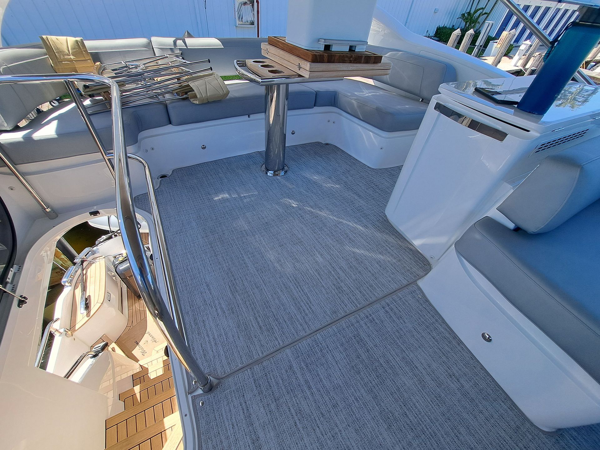 A boat with a table and a chess board on it.