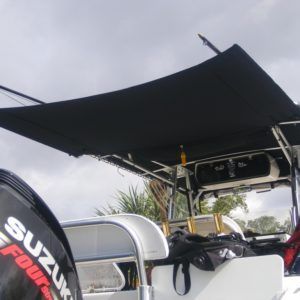 A suzuki outboard motor sits on a boat