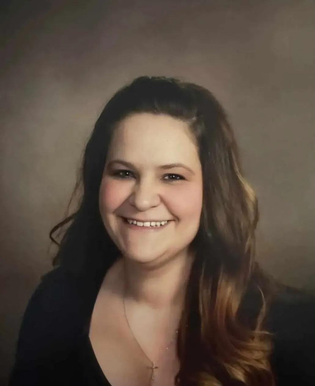 Photo of {{Team Member Name}}