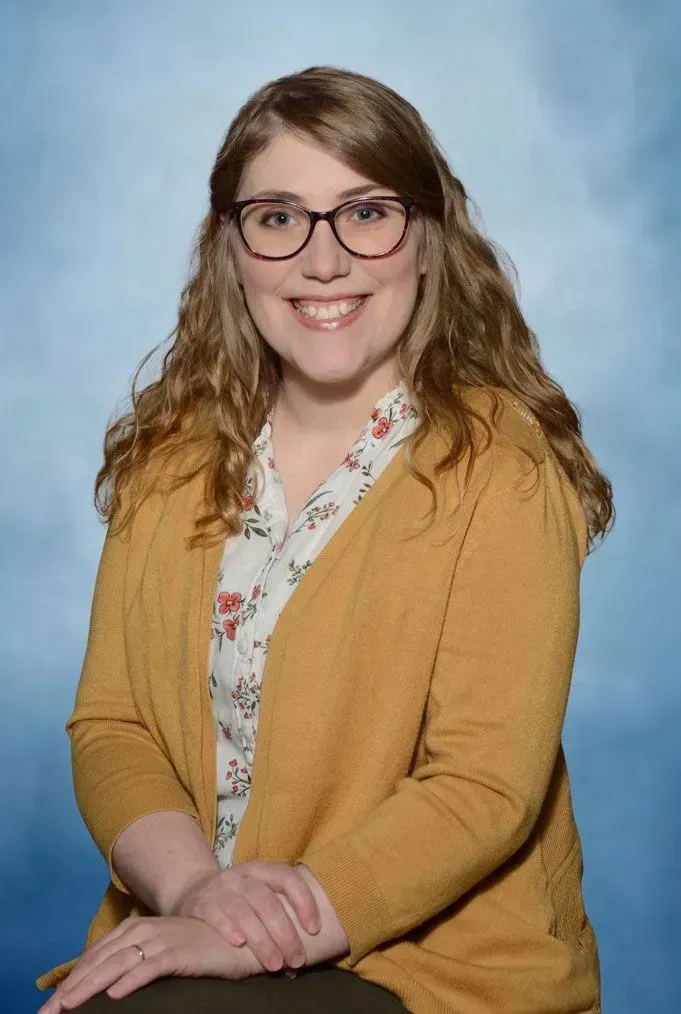 Photo of {{Team Member Name}}