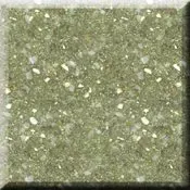 Close-up of a speckled green-gray textured surface with small white flecks.