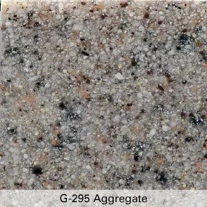 Gray and tan speckled aggregate stone texture with fine black and pink flecks