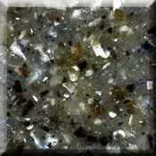 Close-up of a speckled gray granite surface with black, white, and gold flecks