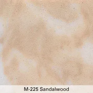 Light beige sandalwood texture sample with subtle cream and tan marbling, labeled “M-225 Sandalwood”