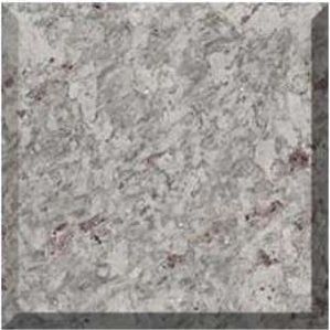 Gray speckled stone or concrete tile with a rough, mottled texture