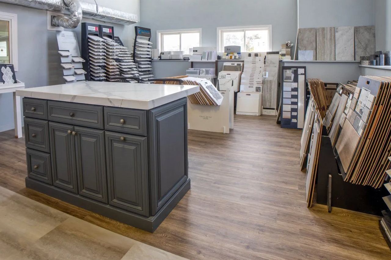 A kitchen with a large island in the middle of the room.