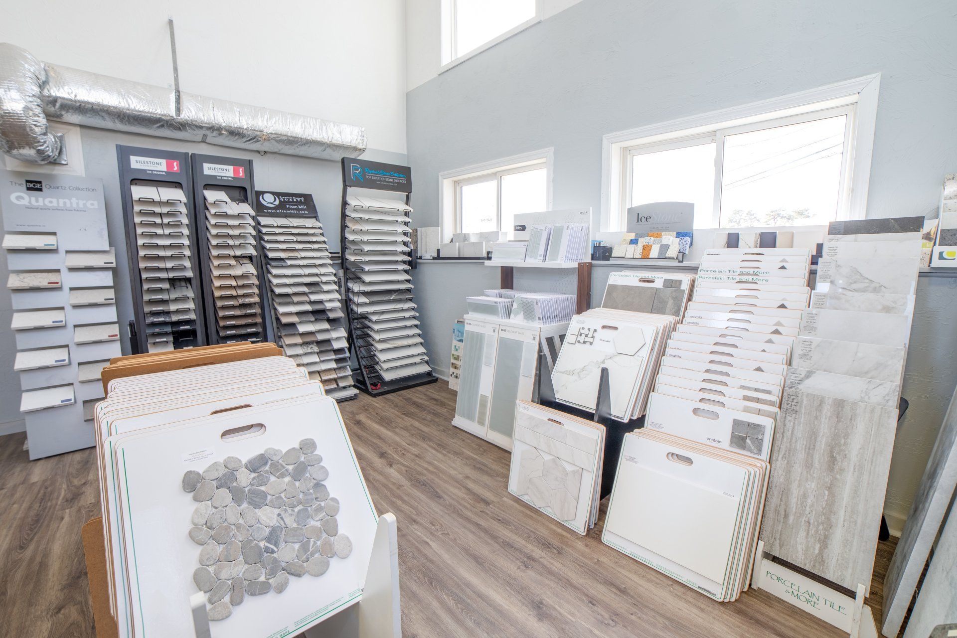 There are many different types of tiles on display in this store.
