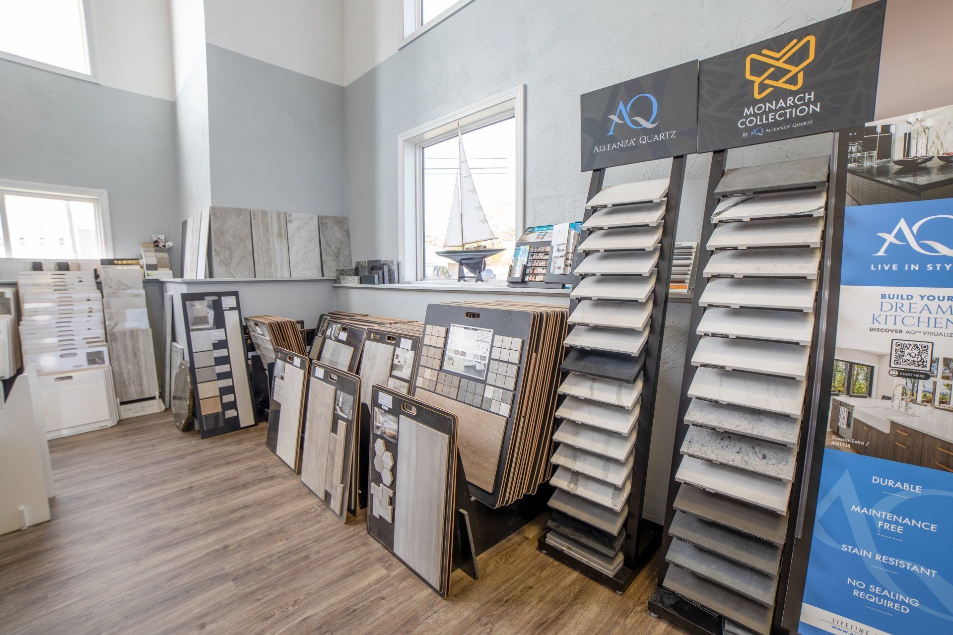 A showroom filled with lots of tiles and signs.