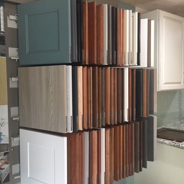 A display of different types of cabinet doors in a kitchen
