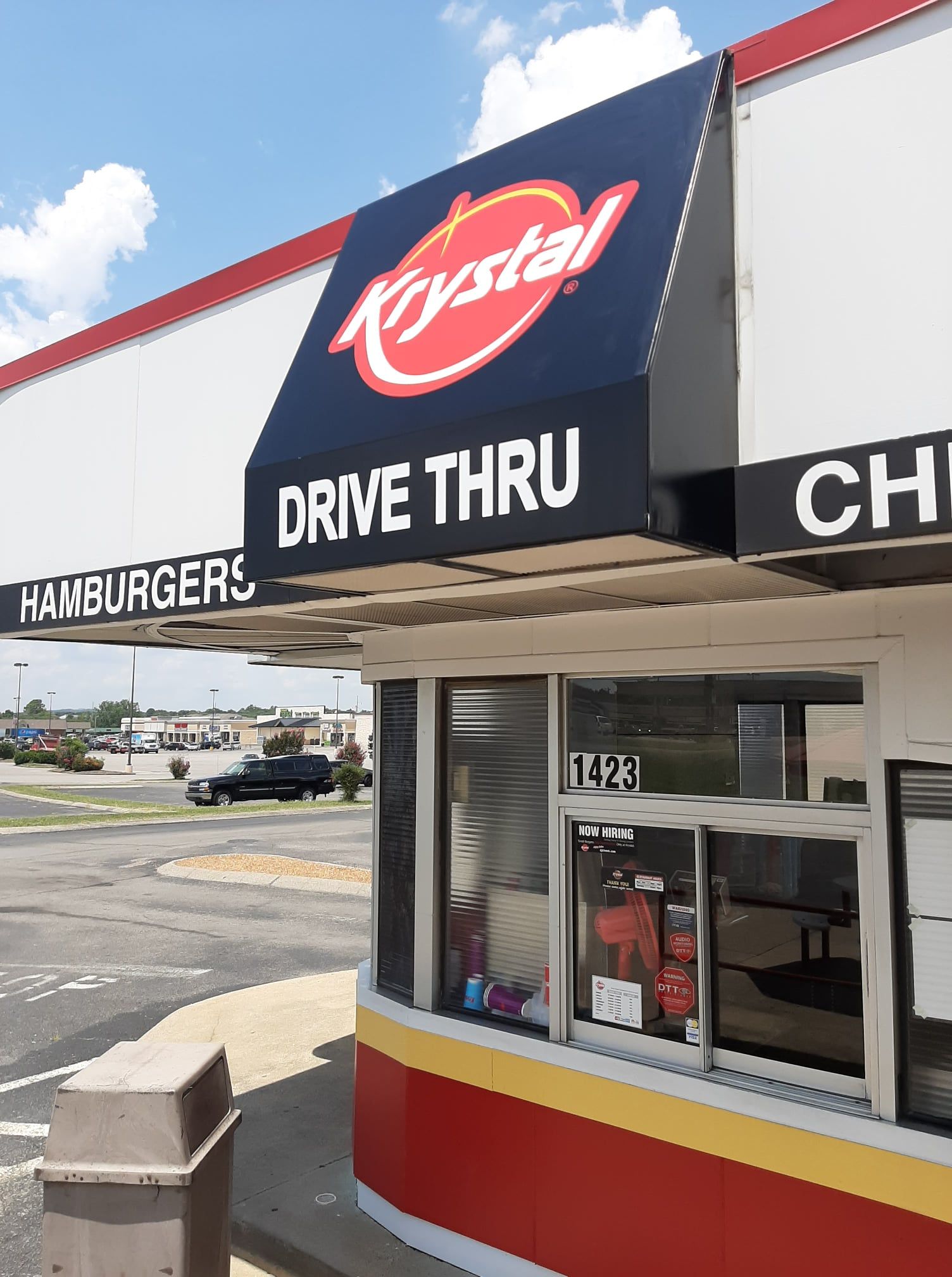 A drive thru at a restaurant called crystal