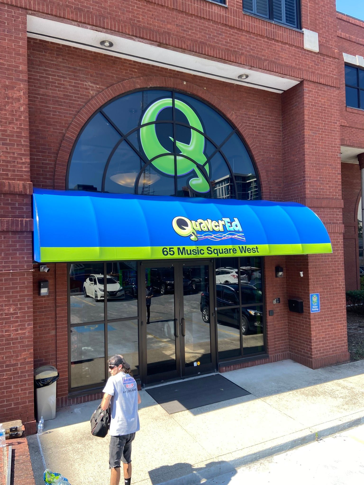 Blue awning & signage