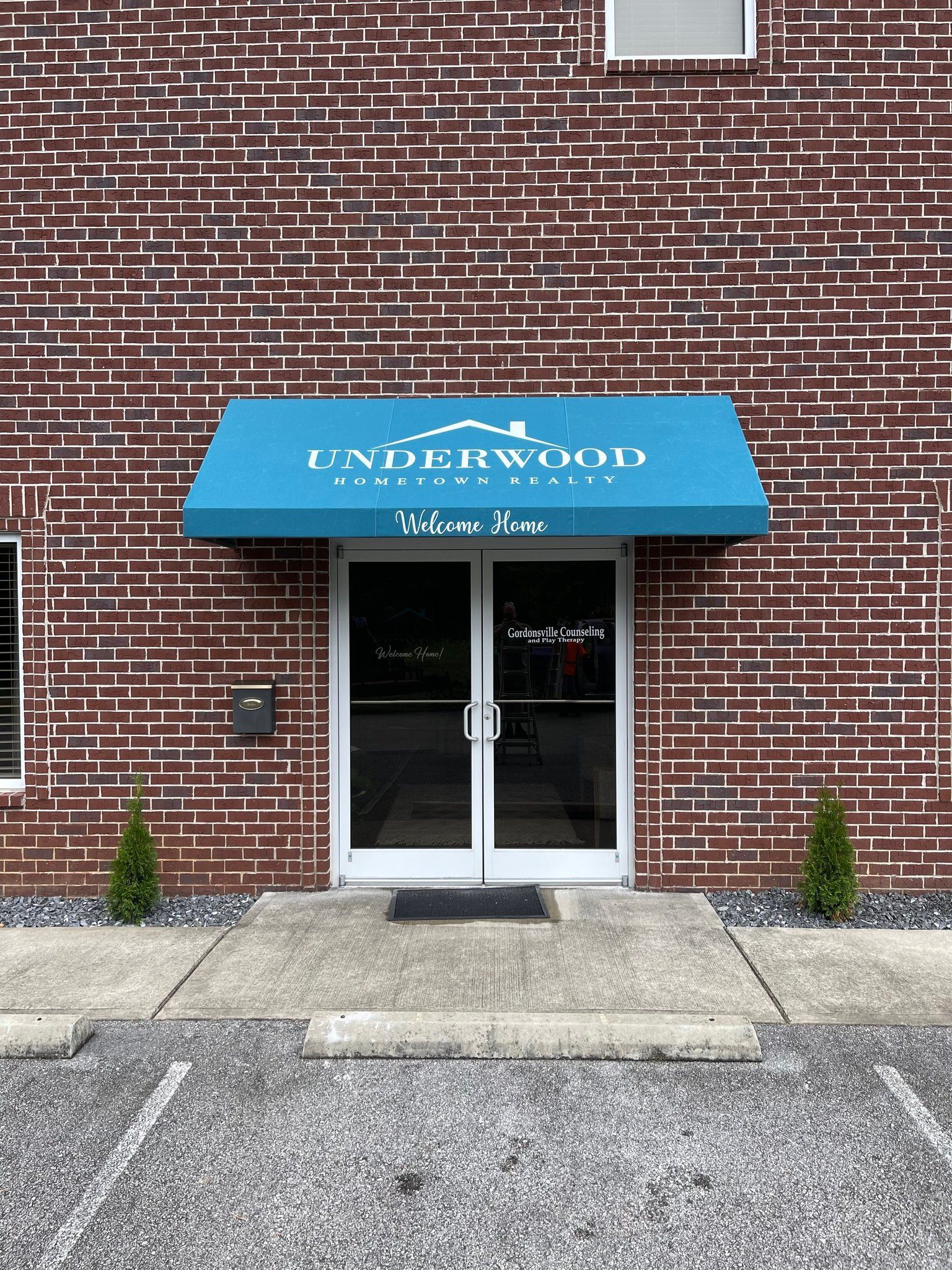 Signage & blue awning