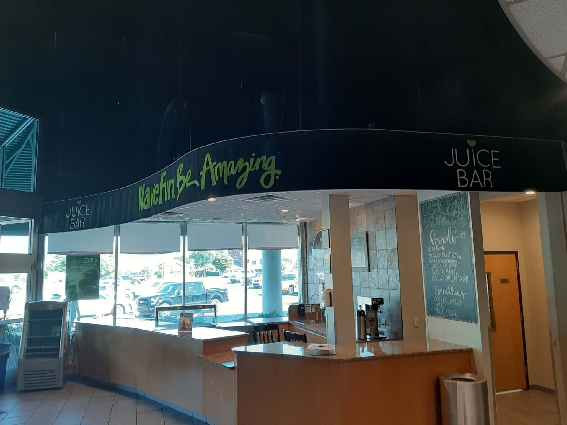 A juice bar with a sign that says we 're amazing