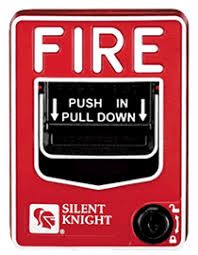 Red fire alarm pull station with “PUSH IN PULL DOWN” label and Silent Knight logo