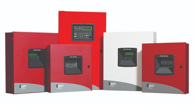 Red and white wall-mounted control panels with digital displays, arranged in a row on a white background