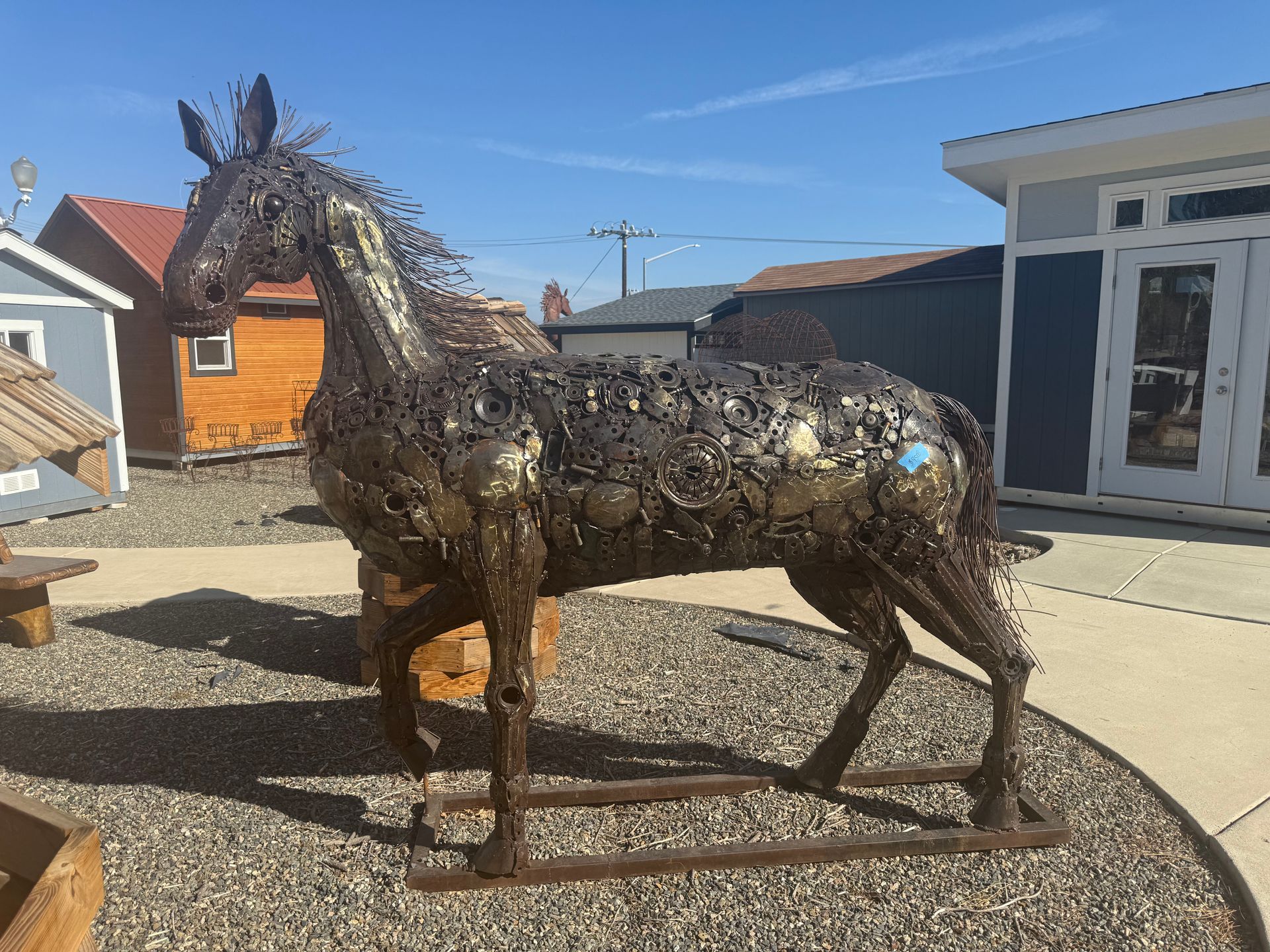 A statue of a horse made out of keys