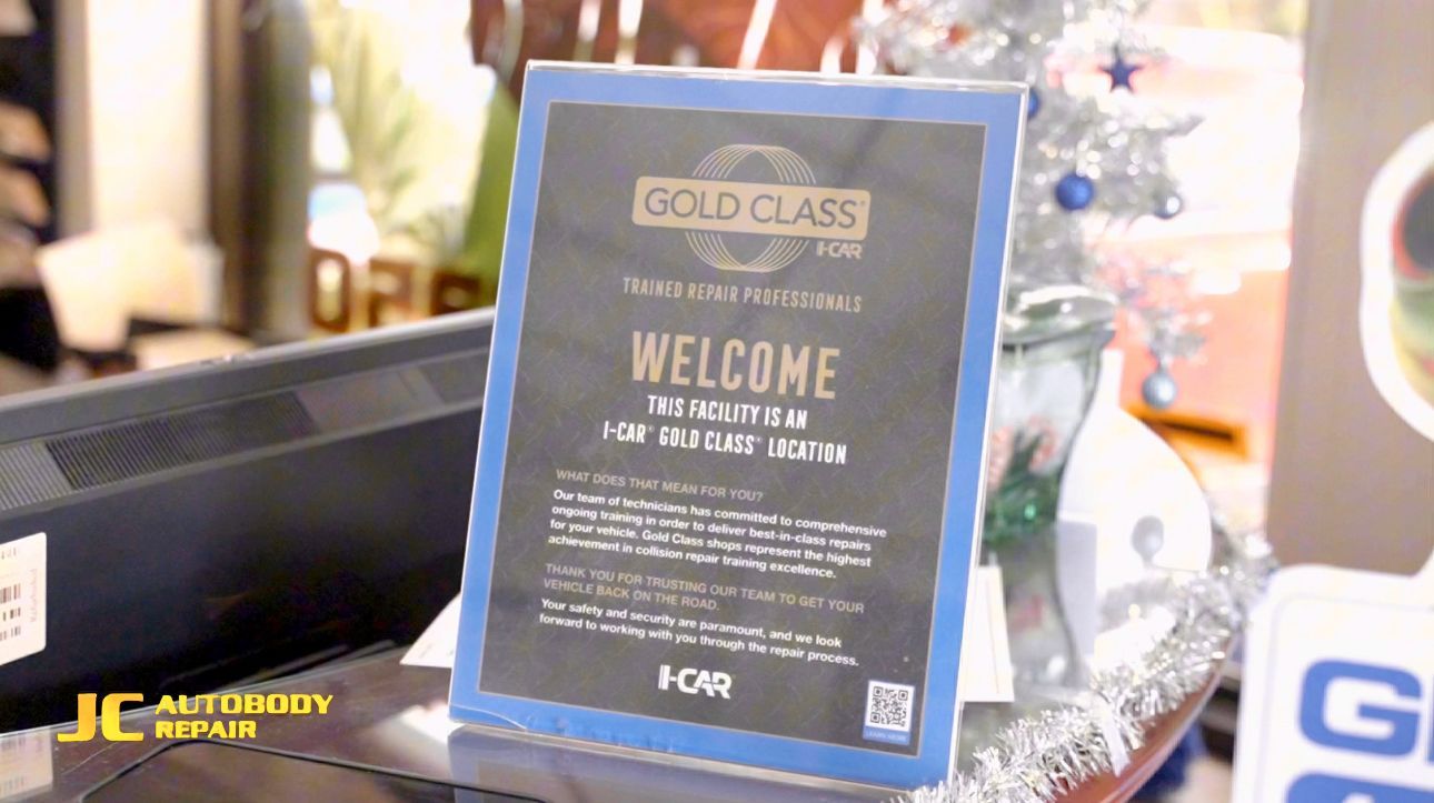 A sign that says welcome on it is on a table