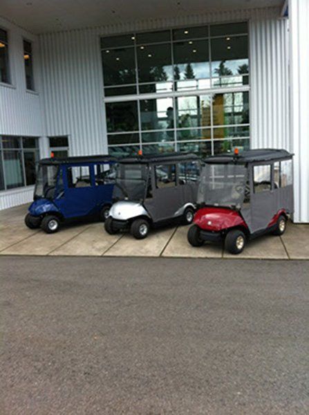 Golf carts with enclosures